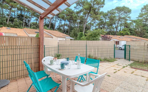 Les Maisons du Lac: Property, Sky, Table, Plant, Building, Azure, Wood, Interior Design, Outdoor Furniture, Shade