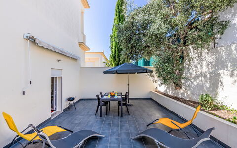 Vila Parra: Table, Furniture, Property, Building, Plant, Shade, Outdoor Furniture, Chair, Interior Design, Wood