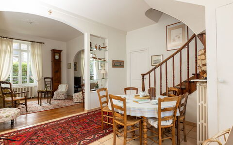 La Solaine: Furniture, Chair, Plant, Building, Picture Frame, Table, Houseplant, Window, Wood, Interior Design