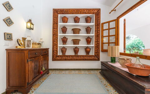 Atzeni: Furniture, Plant, Wood, Interior Design, Cabinetry, Picture Frame, Flooring, Floor, Wall, Living Room