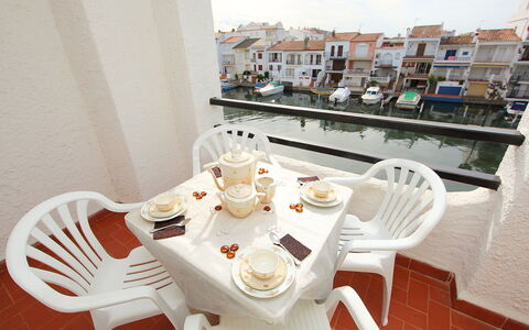 Empuriabrava 218: Table, Tableware, Furniture, Food, Property, Chair, Window, Dishware, Building, Interior Design