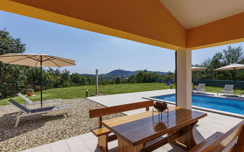 Villa Ana Lucija: Plant, Property, Building, Table, Sky, Shade, Tree, Outdoor Furniture, Window, Architecture