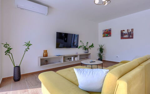 Villa Ana Lucija: Plant, Property, Furniture, Couch, Houseplant, Flowerpot, Interior Design, Lighting, Comfort, Living Room