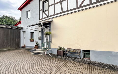 Adenau 385: Plant, Window, Building, Cloud, Road Surface, Architecture, Sky, Asphalt, Urban Design, Wood