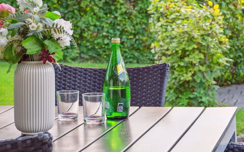Kalli - 100M from the Sea: Table, Drinkware, Flowerpot, Serveware, Outdoor Table, Outdoor Furniture, Bottle, Garden, Houseplant, Hardwood