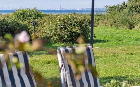 Joella - 75M from the Sea: Roof, House, Home, Cottage, Siding, Estate, Driveway, Garden Buildings, Yard, Shed