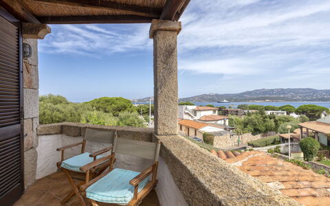 Smeralda: Sky, Cloud, Building, Wood, Water, Shade, Tree, Cottage, Porch, Residential Area