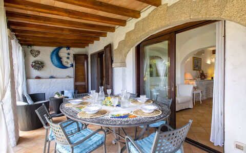 Smeralda: Table, Furniture, Property, Chair, Wood, Interior Design, Floor, Wall, Curtain, Real Estate