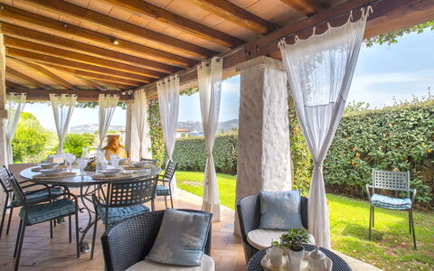 Smeralda: Plant, Furniture, Property, Table, Chair, Shade, Lighting, Interior Design, Architecture, Outdoor Furniture