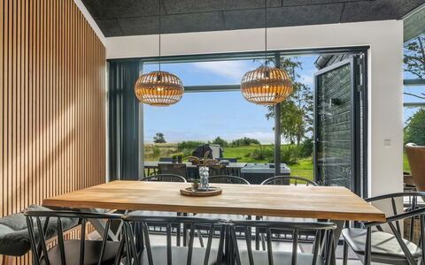 Jahn - 250M to the Fjord: Furniture, Wood, Table, Interior Design, Kitchen & Dining Room Table, Dining Room, Flooring, Ceiling, Chair, Wood Stain