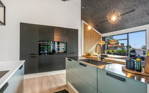 Jahn - 250M to the Fjord: Kitchen, Countertop, Interior Design, Ceiling, Flooring, Kitchen Appliance, Major Appliance, Cabinetry, Furniture, Kitchen Stove