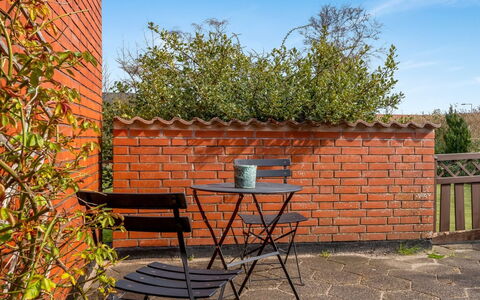 Natalija - 700M from the Sea: Brick, Furniture, Outdoor Furniture, Brickwork, Chair, Outdoor Table, Wood Stain, Flowerpot, Backyard