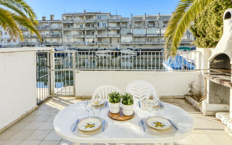 Port Emporda: Table, Property, Sky, Furniture, White, Azure, Building, Chair, Dishware, Outdoor Furniture