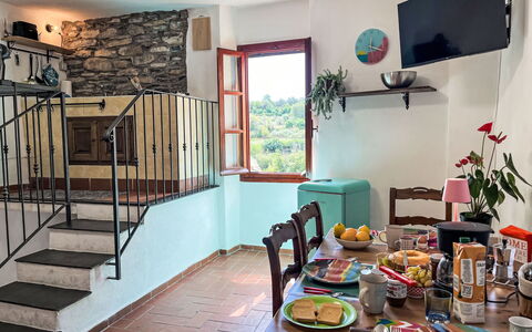 Casa dei Nani: Table, Furniture, Tableware, Chair, Blue, Interior Design, Plant, Floor, Building, Outdoor Furniture