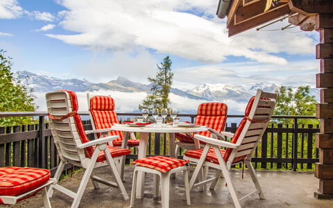 Chalet Soleil: Sky, Cloud, Table, Furniture, Property, Plant, Chair, Building, Outdoor Table, Wood
