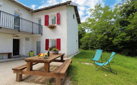 Baita Tersilia Mountain And Lake, Veneto: Plant, Furniture, Sky, Cloud, Building, Window, Outdoor Furniture, Shade, Land Lot, Table