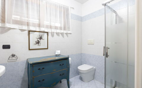Giulia Apartment: Property, Cabinetry, Building, Drawer, Purple, Interior Design, House, Plumbing Fixture, Floor, Bathroom