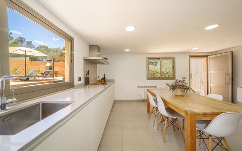 Conchita: Table, Furniture, Countertop, Plant, Cabinetry, Houseplant, Wood, Kitchen, Sink, House