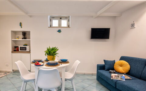 Casetta Di Laura In Massa Lubrense: Furniture, Table, Property, Couch, Chair, Building, Interior Design, Houseplant, Plant, Floor