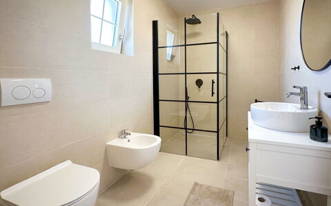 Villa Gaudeo: Bathroom Cabinet, Plumbing Fixture, Property, Sink, Mirror, Bathroom Sink, Tap, Cabinetry, Window, Bathroom