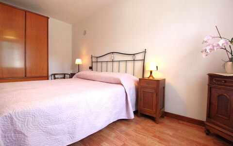 Apartment With Garden, Del Corlo Lake, Belluno: Furniture, Comfort, Building, Wood, Interior Design, Plant, Lighting, Floor, Bed Frame, Bed