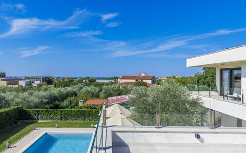 Bianca: Cloud, Sky, Property, Plant, Blue, Building, Water, Azure, Urban Design, House