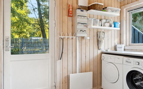 Tyyne - 250M from the Sea: Wood, Flooring, Door, Room, Washing Machine, Laundry Room, Wood Stain, Hardwood, Plank, Major Appliance