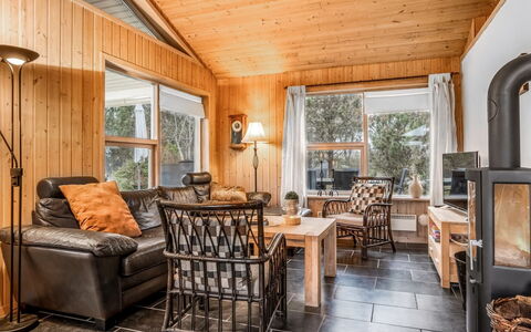 Frido - 500M from the Sea: Wood, Furniture, Living Room, Interior Design, Couch, Home, Cottage, Ceiling, Hardwood, Door