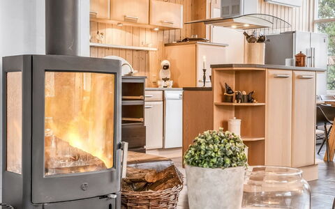 Frido - 500M from the Sea: Furniture, Interior Design, Flooring, Room, Chair, Wood Stain, Light Fixture, Hardwood, Lamp, Cabinetry