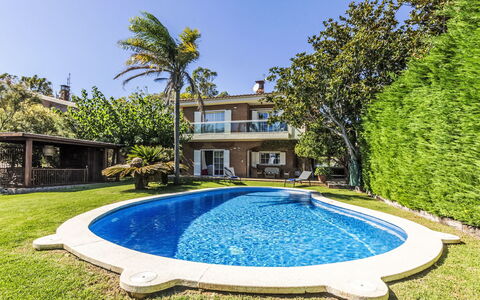 Luxury B: Water, Property, Sky, Nature, Azure, Building, Plant, Natural Landscape, Grass, Leisure