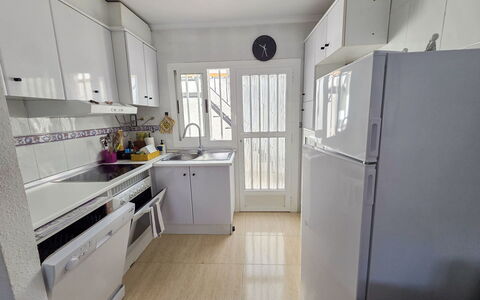 Hamber: Major Appliance, Kitchen Appliance, Kitchen, Flooring, Wood, Floor, Cabinetry, Countertop, Interior Design, Home Appliance
