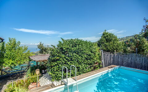 Villa Solaria with Private Pool: Water, Sky, Plant, Cloud, Property, Swimming Pool, Azure, Vegetation, Tree, Residential Area