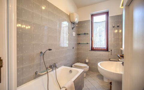 Villa Solaria with Private Pool: Plumbing Fixture, Tap, Property, Sink, Bathtub, Bathroom Sink, Bathroom, Interior Design, Lighting, Architecture