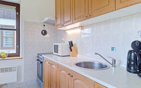 Green Valley Park Stárkov 7: Countertop, Kitchen Appliance, Kitchen, Cabinetry, Major Appliance, Flooring, Plumbing Fixture, Wood, Interior Design, Sink
