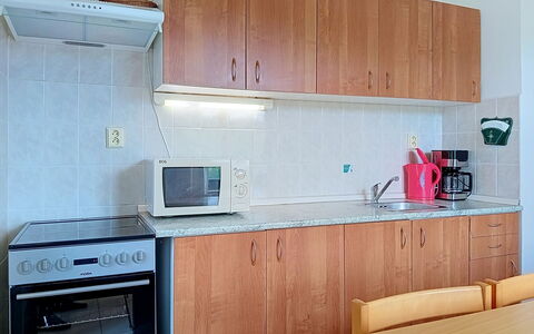 Green Valley Park Stárkov 16: Flooring, Wood, Furniture, Floor, Kitchen, Countertop, Interior Design, Cabinetry, Kitchen Sink, Major Appliance