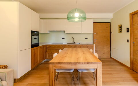 Val Genova: Furniture, Interior Design, Countertop, Flooring, Cabinetry, Floor, Kitchen, Wood, Ceiling, Light Fixture