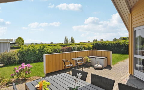 Halla - 250M from the Sea: Home, Land Lot, Roof, Garden, Shade, Outdoor Furniture, Lawn, Landscaping, Yard, Chair