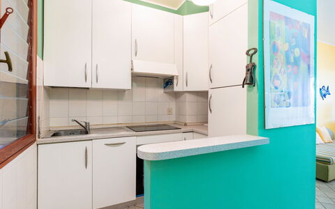 Il Nido sul Mare: Property, Cabinetry, Kitchen Sink, Green, Sink, Interior Design, Kitchen Appliance, Architecture, Flooring, Home Appliance