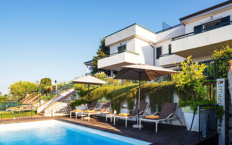 Villa Golfo Di Napoli With Private Pool: Water, Plant, Sky, Property, Building, Swimming Pool, Window, Chair, Outdoor Furniture, Umbrella