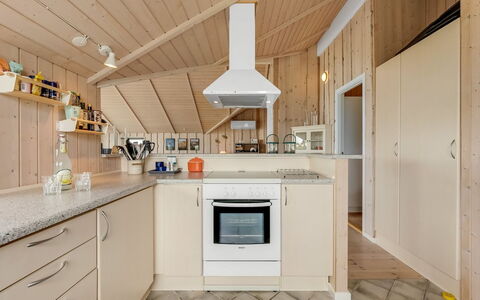 Märta - 250M from the Sea: Kitchen, Countertop, Kitchen Appliance, Interior Design, Flooring, Wood, Major Appliance, Ceiling, Cabinetry, Floor