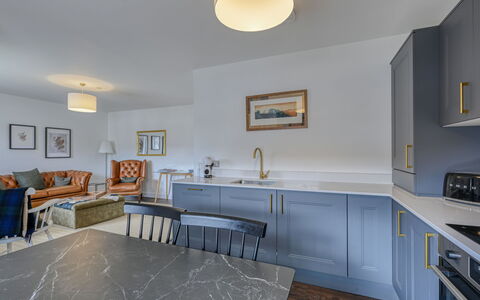 Craigmonie Apartment: Flooring, Interior Design, Wood, Ceiling, Floor, Furniture, Kitchen, Countertop, Cabinetry, Lighting