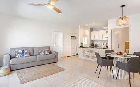 Mila Moon: Furniture, White, Ceiling Fan, Couch, Table, Wood, Picture Frame, Lighting, Living Room, Interior Design
