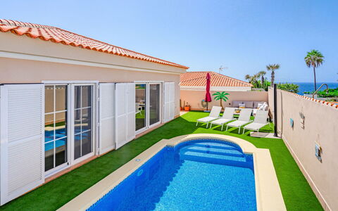 Mila Moon: Sky, Plant, Property, Building, Azure, Water, Window, Swimming Pool, Tree, Architecture
