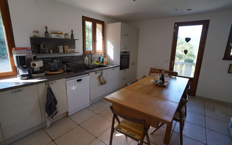 Lou Lann Vras: Furniture, Kitchen, Flooring, Countertop, Wood, Cabinetry, Interior Design, Kitchen Appliance, Floor, Room