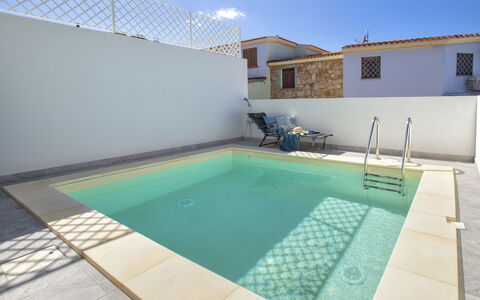 Victoria: Water, Building, Property, Sky, Window, Swimming Pool, Azure, Rectangle, Shade, Condominium
