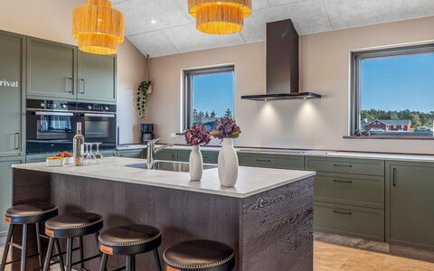 Sönke - 4Km from the Sea: Countertop, Interior Design, Kitchen, Furniture, Flooring, Light Fixture, Ceiling, Wood, Cabinetry, Kitchen Appliance