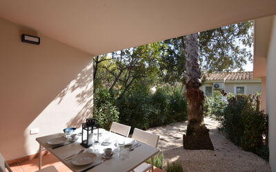 Mirto Marino 510.8: Plant, Furniture, Table, Building, Sky, Chair, Cloud, Shade, Window, Wood