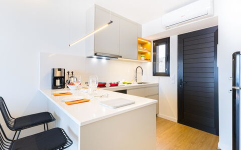 Los Canarios 527: Cabinetry, Furniture, Building, Countertop, Chair, Kitchen, Orange, Interior Design, Kitchen Appliance, House