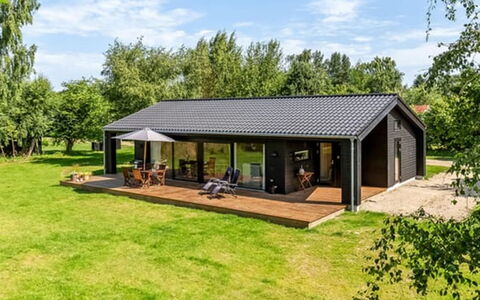Aruna - 550M from the Sea: Roof, House, Home, Cottage, Door, Siding, Deck, Porch, Plank, Hardwood