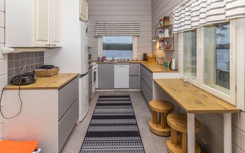 Onnimanni: Wood, Flooring, Kitchen, Interior Design, Major Appliance, Kitchen Appliance, Ceiling, Floor, Countertop, Room